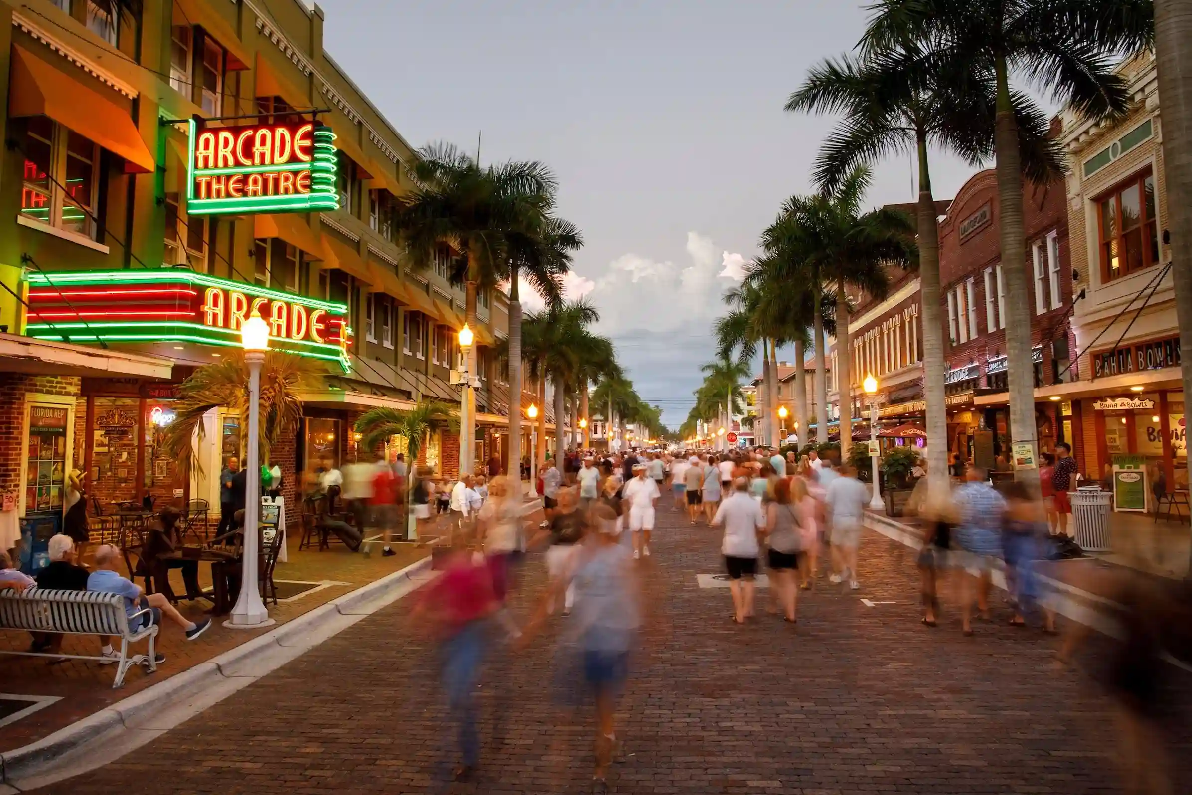 Couple using laptop outdoors