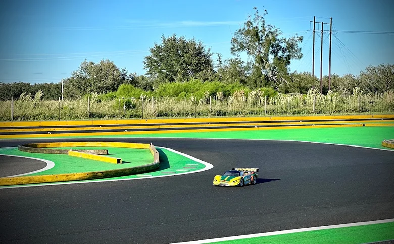 Couple using laptop outdoors